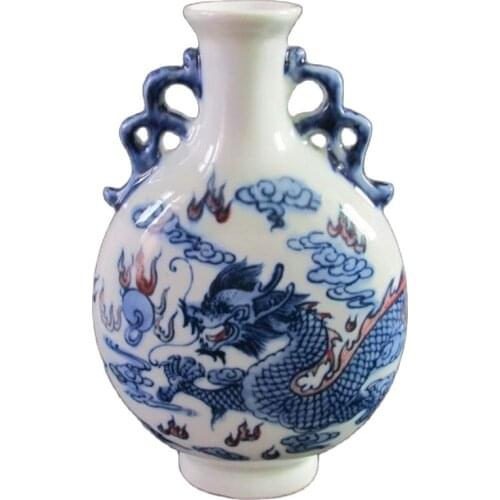Antique Chinese blue and white porcelain dragon on both sides. The vase
