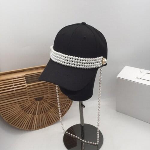 For somebody elses hand as a kind of heavy baseball cap female black pearl cotton travel sweet fashion hat cap