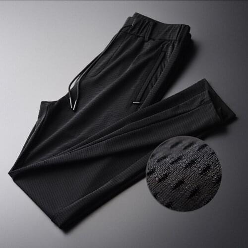 Classic Hollow Out Fabric Silky Breathable Men Pants New Summer Thin Silm Black Comfortable Men Pants Plus Size M XL 2XL 3XL 4XL
