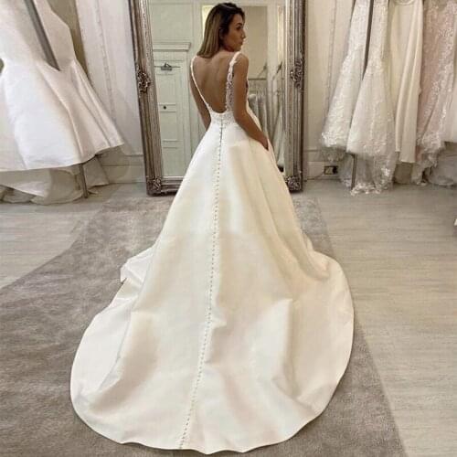 White Wedding Dresses Lace Appliques Simple V-neck Backless Wedding Gowns With Pockets Custom Made Free Shipping