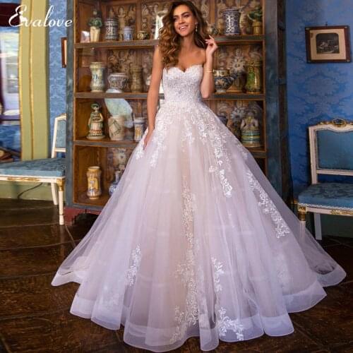 EVALOVE Romantic Strapless Lace Up A-Line Wedding Dress Luxury Beading Appliques Off the Shoulder Customized Vintage Bridal Gown
