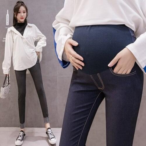 2021 Maternity Jeans Korean Fashion Pregnancy Stomach Lift Pants Winter New Pregnant Women High-elastic Fried Flower Feet Jeans