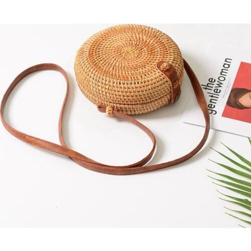 INS new ladies hand-woven bag round rattan retro literary hand-woven leather buckle package Bohemia Beach Messenger bag