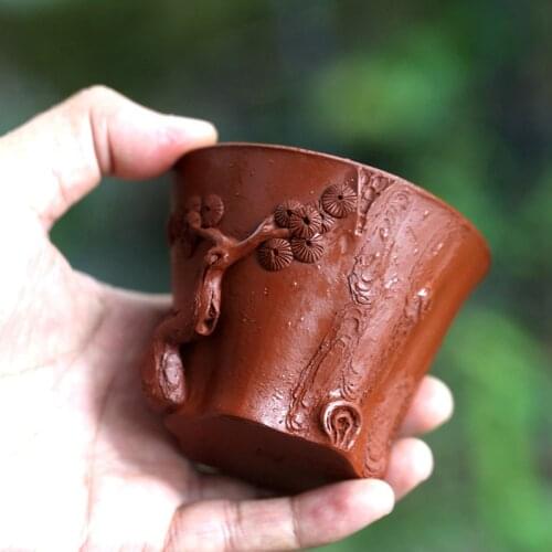 Yishuitang Yixing raw ore purple sand cup hand tea master cup vermilion pine branch cup 150ml hand Decal