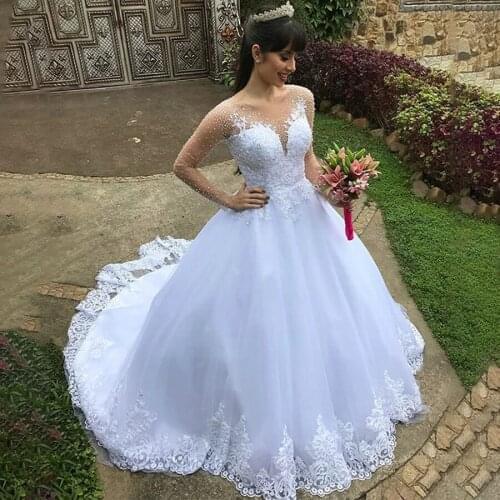 See Through Long Sleeve Beaded Wedding Dresses Lace Appliques Elegant Bridal Gowns Ball Gowns Crystals vestido noiva sereia