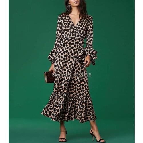 Silk V Neck Wrap Style Knit Leopard Midi Dress With Long Flare Sleeves & Features Upper Body Knit Silk & Silk Crepe De Chine Hem