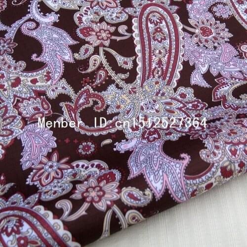 WF155 - 70cmx50cm PVC coated waterproof fabric - paisley flower on deep brown