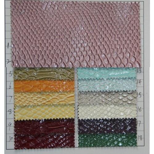 Factory wholesale fast express Snake Print stretch leather high-gloss embossed Snake synthetic leather luggage bags