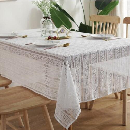White lace tablecloth with hollowed out stripes