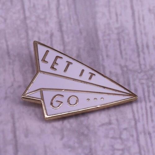 Paper airplane badge