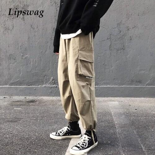 2021 Spring Fashion Loose Pocket Cargo Pants Men Casual Solid Drawstring Trousers Male Summer New Harajuku Long Pants Streetwear