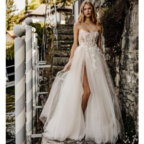 New Arrival Beach Wedding Dresses Spaghetti Lace Appliques Boho Wedding Gowns with Shorts High Split Bridal Vestidos De Novia