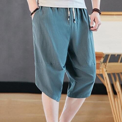 Solid Color Capri Pants Elastic Waist Men Wide Leg Irregular Hem Thin Men Pants Sweatpants