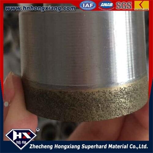 Drilling holes with sintered 35mm diamond thread shank drill bit