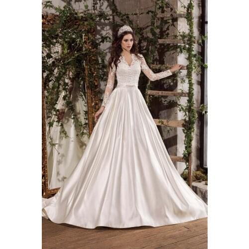 2021 Backless Long Sleeve Wedding Dresses Appliques Lace Beaded V neck Bridal Gowns Vestidos de novia Custom Size