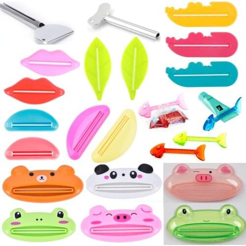 HOT Bathroom Home Tube Rolling Holder Squeezer Easy Cartoon Toothpaste Dispenser