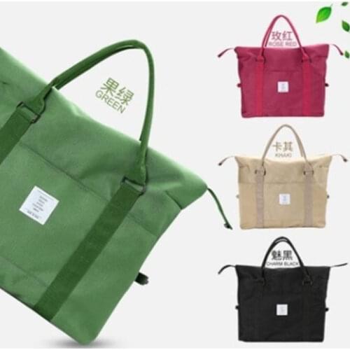 Korean version large capacity travel clothing bag portable travel bag clothing bag luggage bag female waterproof travel bag