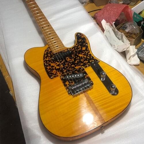 High-quality 6-string guitar with tiger pattern veneer, retro maple neck and puppy head electric guitar