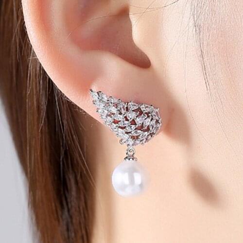 Zlxgirl Brand Angle wings pearl stud earrings jewelry Womens bridal gifts Fashion Women Earring wedding ears piercings