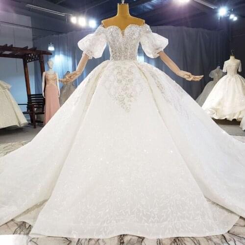 Elegant Off The Shoulder Puffy Ball Gown Wedding Dress Appliques Tulle Lace Wedding Gown Backless Sparkle Robe De Mariee