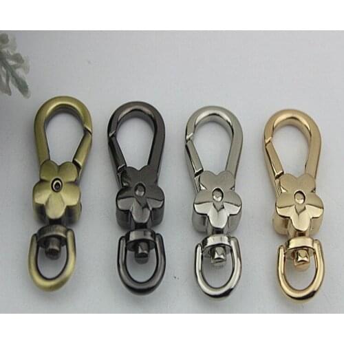 10pcs/ lot 4 colors Lovely flowers the button dog buckle fat buckle metal bag buckles ornament clasp