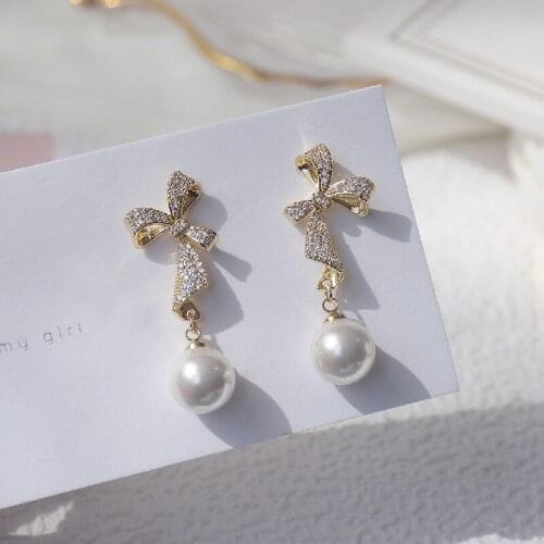 Korean fashion jewelry 14K real gold plating exquisite copper inlaid zircon bow earrings sweet beauty pearl pendant earrings