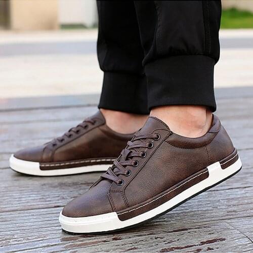 Men sneakers 2021 new pu leather breathable vulcanized men shoesCasual shoes lace-up solid comfortable mans footwear plus size