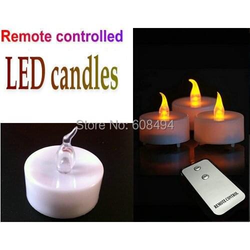 24pcs/lot Battery operated LED AMBER Flicker Candles W/Remote Controller clear flamelessTealight lamp Home Wedding Party Decor
