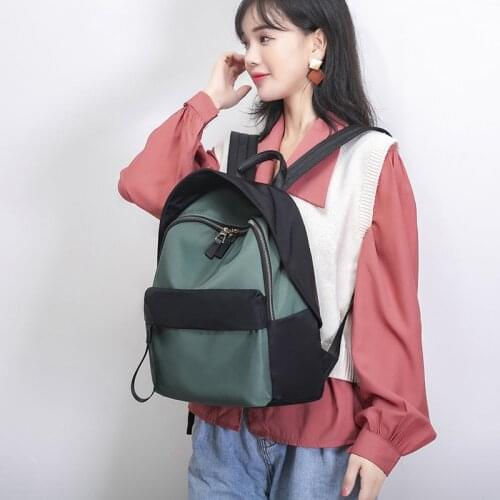 Obstiné Women's Green Backpacks