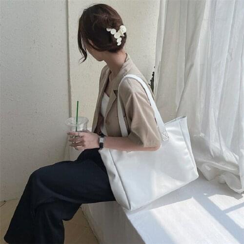 New summer womens bag simple hand bag fashion trend single shoulder bag large capacity soft PU tote bag