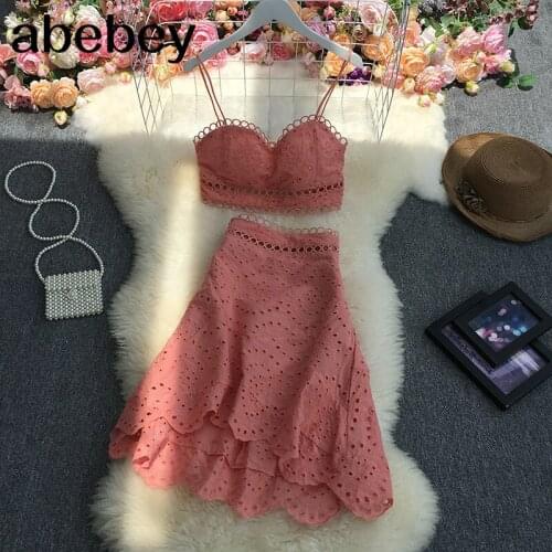 2021 New Summer Fashion sleeveless wrap strap Vest Top + hollow out high waist pleated solid A-line Skirt two-piece set