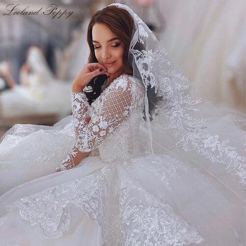 Lceland Poppy Luxury Ball Gown Wedding Dresses Full Sleeves Tiered Lace Appliques Floor Length Tulle Bridal Gowns