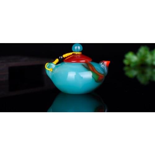 Natural Xinjiang chicken blood stone teapot swing small play piece