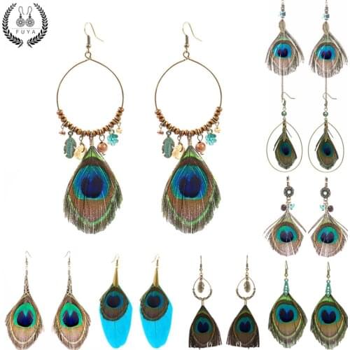 2020 Feather Womens earrings Ethnic Round Wooden Beads Peacock Feather Long tassel earrings for women Vintage Bohemian earring