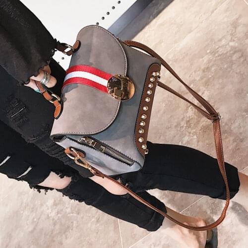 Frosted rivet hit color shoulder bag female autumn and winter new style Korean all-match handbag punk style messenger bag tide