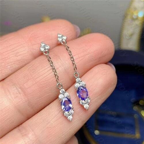The new 925 silver inlaid natural tanzanite earrings are simple and elegant, gem size 4*5mm