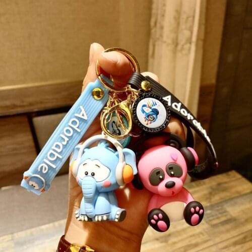 Creative cute gorilla plush keychain new couple bag pendant car keychain promotion small gift
