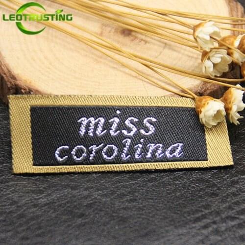 1000pcs Customizd High-grade Damask Labels with Spun Silver Logo Embroidered Shinny Women Clothing/Sweater Labels Tags