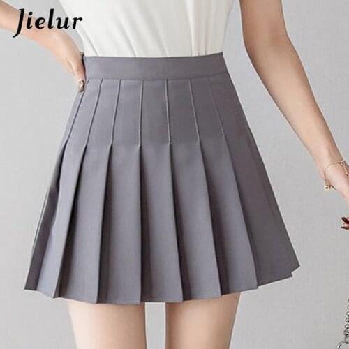 Jielur 2021 Summer 4 Colors Mini Skirts Kawaii New Saia High Waist Pleated Skirt Women Chic Preppy Style Pink Black Skirt Short