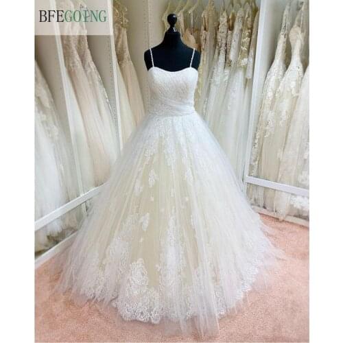 Ivory Lace Spaghetti Straps Sleeveless Floor-Length Ball Gown Wedding Dresses Chapel Train Custom Made Real/Actual Photos