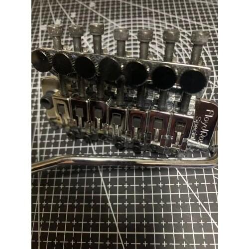 Electric guitar trill system, electric guitar bridge, electric guitar 7 string trill system