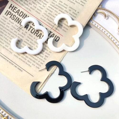 Temperament fashion 2021 French elegant flower girl black and white butterfly hollow-out resin acrylic earring