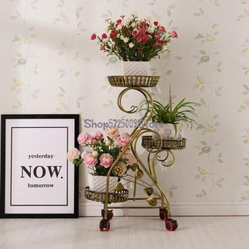 Multi-layer wheeled wrought iron mobile flower stand European style assembled balcony simple corner living room shelf garden bon
