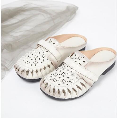 2019 summer new style sandals slippers leather cowhide womens slippers Baotou hollow word drag flowers low heel womens shoes