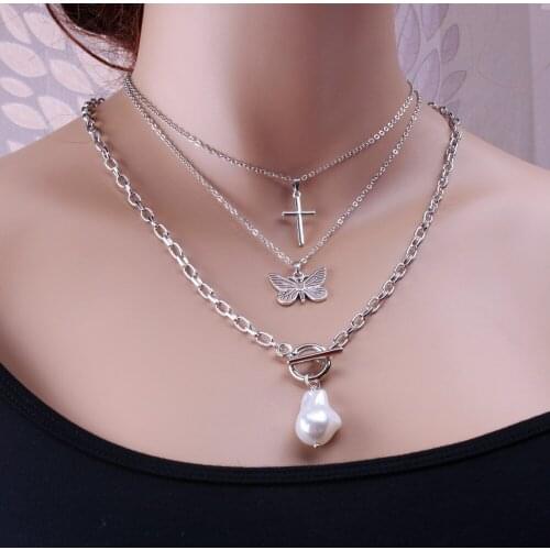 Korean fashion multi-layer cross baroque pearl butterfly necklace female fashion new three-piece popular jewelry