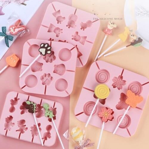 Free Shipping 20 Shapes Cute Silicone Lollipop Molds With 20pcs Sticks Chocolate Candy Moulds Cake Decorating Form Bakeware Set