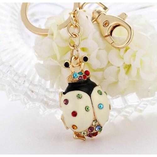 2017 Z fashion popular and lovely rhinestone white drop oil color small bug bag key to the holiday gift can be customize