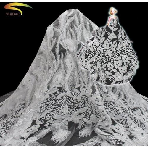 Niegrian comfortable and transparent white lace embroidery fabrics