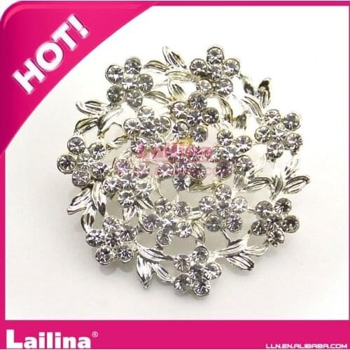 Fashion button with clear rhinestone