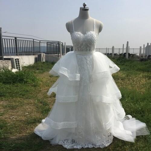 Stunning Spaghetti Strap Mermaid Lace Wedding Dresses with Detachable Train Beading Ruffles Tiered Skirt Chapel Bridal Gowns